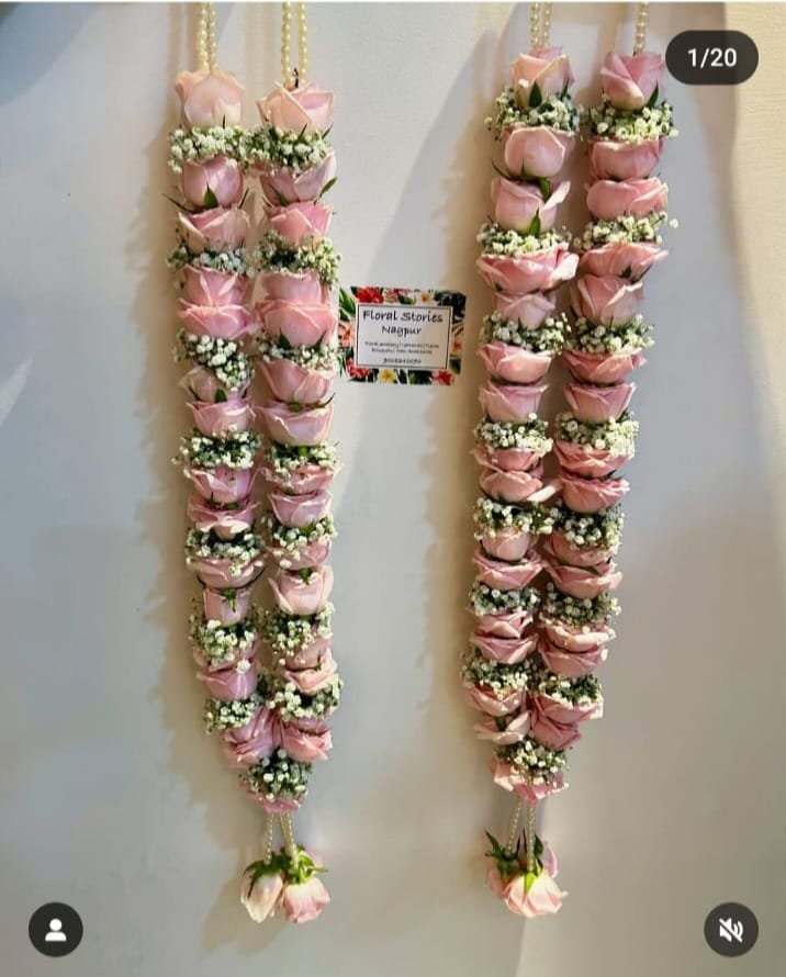 Trending Fresh Garland: Elegant Roses with Delicate Gypsophila